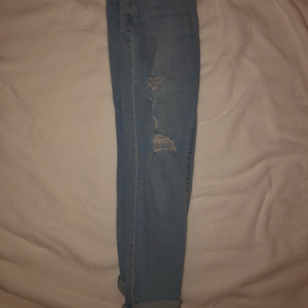 Distressed low rise boyfriend jeans